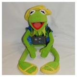 Plush Kermit the Frog photographer on vacation