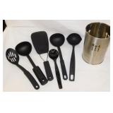 Kitchen utensils in stainless caddy
