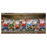 7 garden yard art working gnomes,