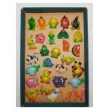 Vintage plastic refrigerator magnets: