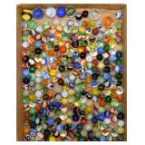 Flat of vintage swirl glass marbles, 7 shooters