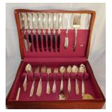 Oneida Tudor pattern silverware in chest