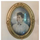 Antique chalk portrait of lady under oval convex