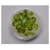 14 green Peridot gemstones