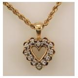 10K yellow gold: Diamond heart pendant on 18'