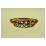 14K yellow gold ring w/ 7 diamonds, size 11