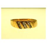 14K yellow gold ring w/ 9 channel set diamonds,