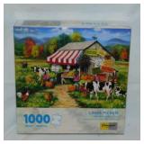 Three 1,000 pc. Jigsaw puzzles