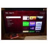 2019 TCL 50' Roku 4K smart TV television on stand