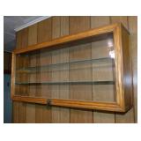 Oak & glass showcase display w/ brass lion head