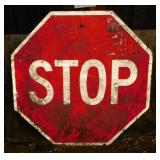 Retired metal STOP road sign