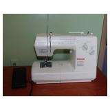Singer sewing machine w/ manual & foot pedal