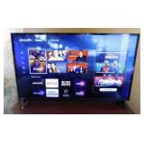 Philips 32" Roku TV television w/ remote on stand