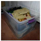 Storage tote w/ lid full of sewing fabric -