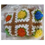Hand crocheted Granny Square afghan in storage bag