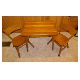 Child's wooden table & 2 chairs,