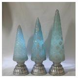 3 modern lighted ice blue Christmas trees,