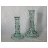 2 ice blue glass candlesticks, 6" & 8" tall