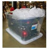 Storage tote w/ lid full of Christmas dï¿½cor