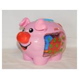 Fisher Price Laugh & Learn musical pig piggy bank