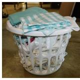 Laundry basket full of kitchen linens: Towels -