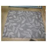 Indoor/outdoor flat weave area rug w/ botanical