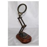 Vintage Watts & Sons brass magnifying glass on