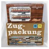 2 vintage diecast railroad train cars in boxes: