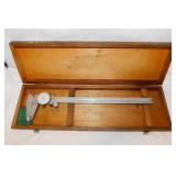 Vintage Mitutoyo dial caliper in wooden case