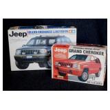 2 Jeep Grand Cherokee model kits in boxes:
