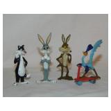 Four 1988 Warner Bros. Looney Tunes cast metal