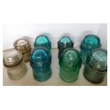 8 aqua & clear glass insulators