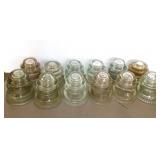 12 clear glass insulators