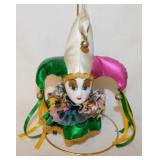 Porcelain harlequin mardi gras jester ornament on
