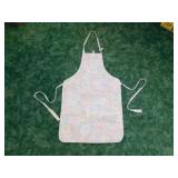Designs quilted apron with floral accents