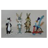 Four 1988 Warner Bros. Looney Tunes cast metal