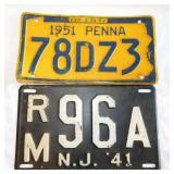 2 embossed metal license plates: