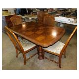 Solid wood dining table w/ 2 leaves - 4