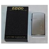 2 Zippo lighters: NAA National Auctioneers Assoc.