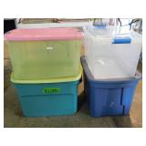 4 storage totes w/ lids, largest is 21 gallons