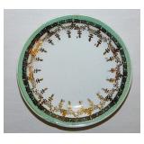 Gilded floral porcelain butter pat, unmarked