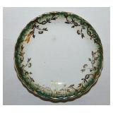 Gilded floral porcelain butter pat, unmarked