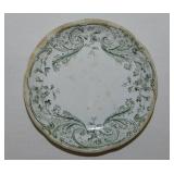 Green floral porcelain butter pat, unmarked