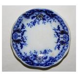Gilded flow blue porcelain butter pat