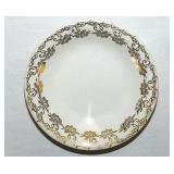 Gilded stylized floral porcelain butter pat,