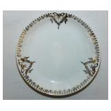 Gilded porcelain butter pat, unmarked