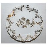 Gilded floral porcelain butter pat, unmarked