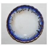 Gilded flow blue porcelain butter pat