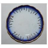 Gilded flow blue porcelain butter pat