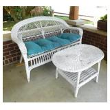 White wicker patio loveseat w/ cushion & table